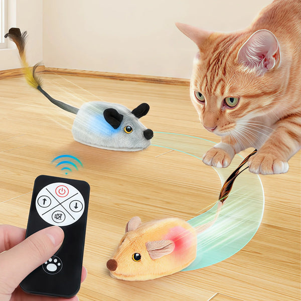 A ginger cat interacts with an electronic toy mouse on a wooden floor, activated by motion sensors.