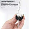 A hand holds a disassembled blade head of a pet hair clipper, showing its structure for washing and cleaning.