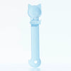 A light blue long-handled pet food dispensing spoon with a cat head design.