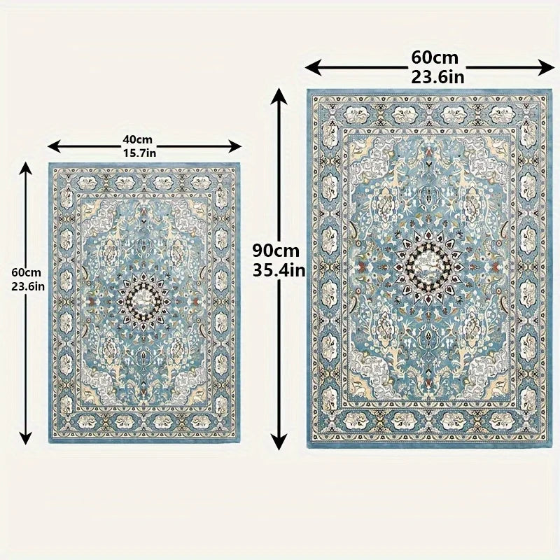 A rectangular blue and cream reusable dog pee pad with decorative patterns.