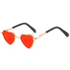 Red heart-shaped pet sunglasses for cats and dogs with gold and black frames
