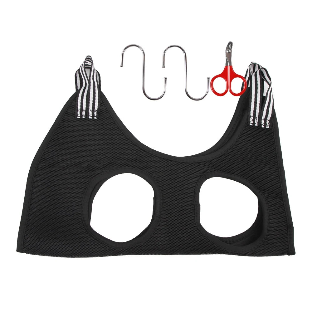 Black pet nail trimming hammock with a scissor and hook tool for restraining cats