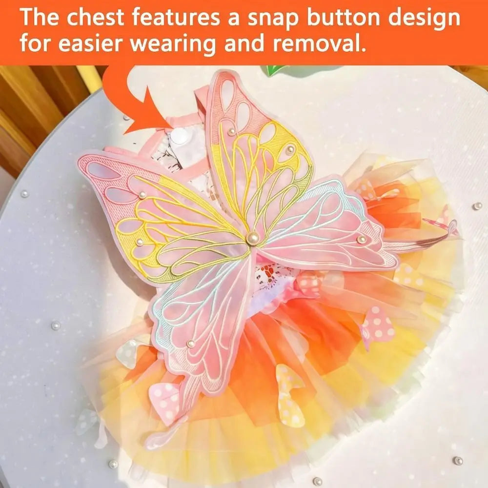 A pink butterfly pet dress featuring a snap button design for easier wearing and removal.