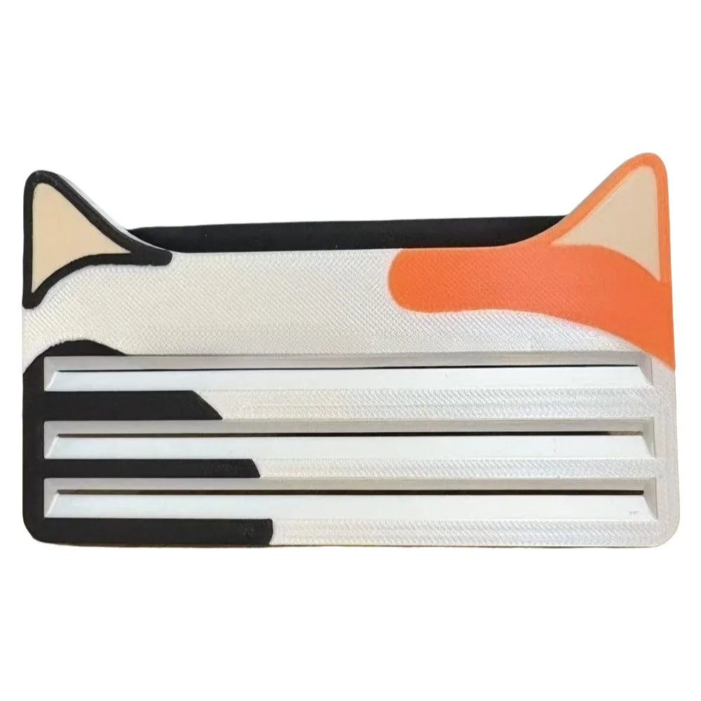 A reusable cat food pouch scraper with a white and orange design.