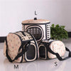 A beige breathable pet carrier backpack for cats and small dogs shown in various views.