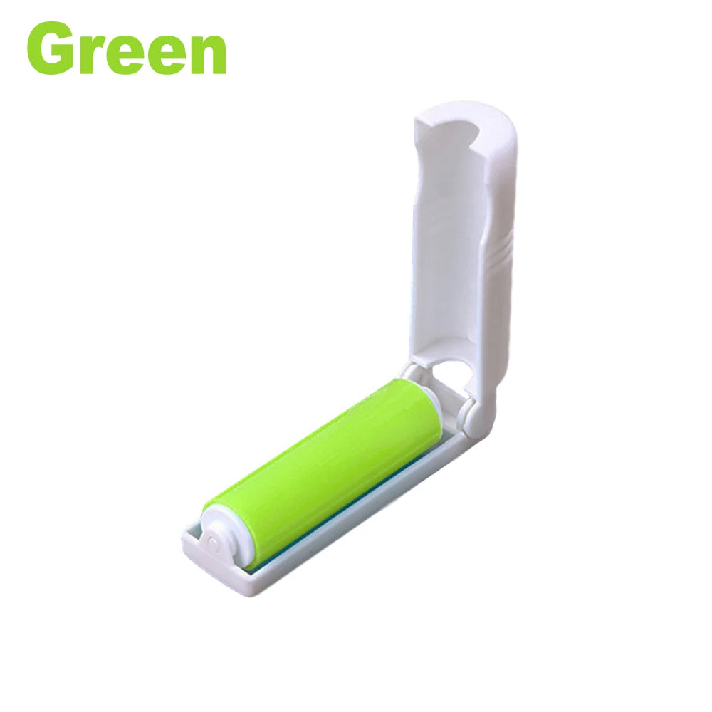 A white lint roller with a bright green roller core for cleaning pet hair and dust.