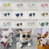 A collection of vintage round pet sunglasses for dogs and cats in various colors and styles.