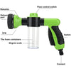 A green high-pressure foam cleaning gun with various attachments and a clear foam container.