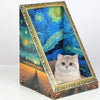 A framed artwork featuring a cat resting inside, set within a vibrant blue and green landscape.