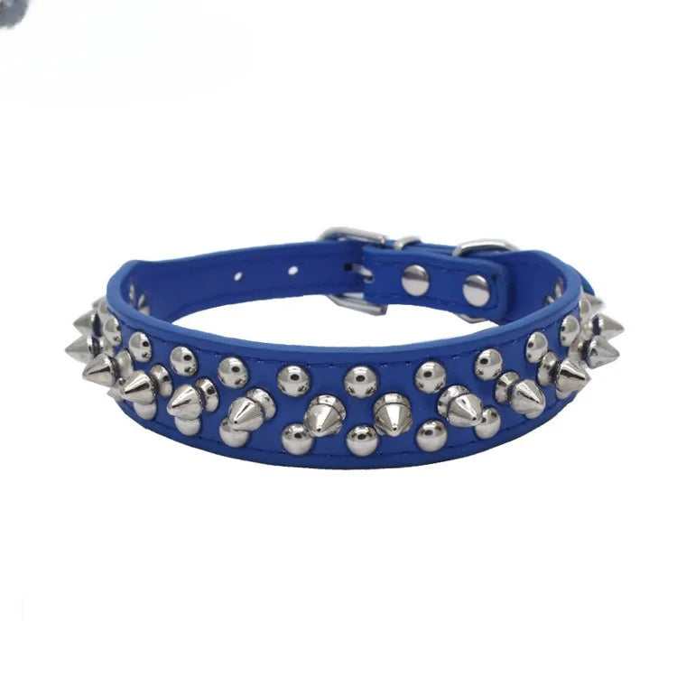 A blue leather dog collar adorned with silver spikes and featuring a buckle closure.