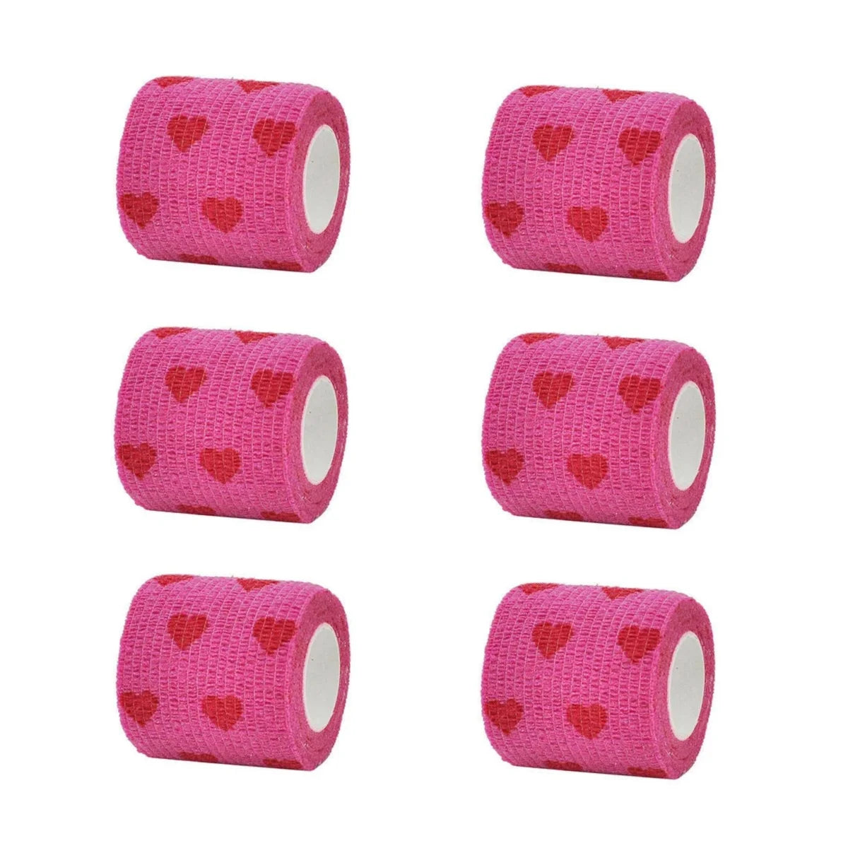 Cuatro rollos de vendas autoadhesivas rosas para sujetar tatuajes en mascotas