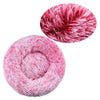 A pink plush round pet bed with a removable washable cover, shown in two views.