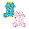 A pair of soft cotton dog pajamas featuring a pattern of gray and teal animals.