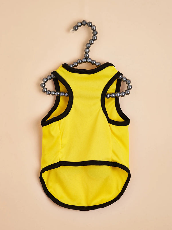 A bright yellow lightweight vest for a dog or cat with black trim and silver beads.