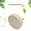 A round, light-colored solid wood feeding bowl for small pets.
