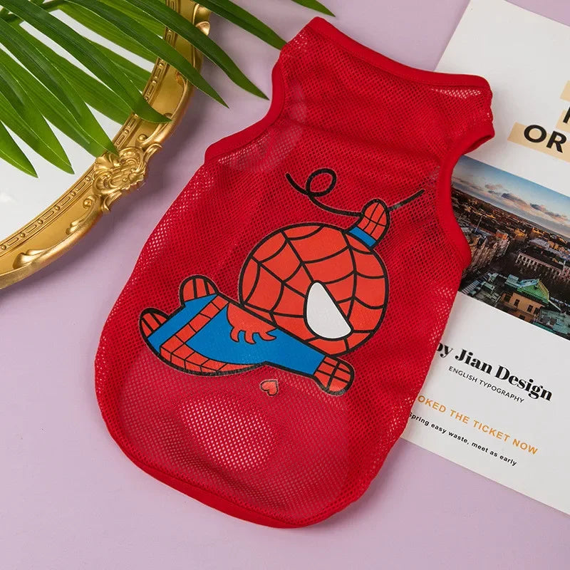 A red breathable mesh pet vest with an orange and blue Spider-Man cartoon print resting on a white background.