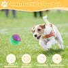 A dog is playing with an indestructible dog ball on the grass, demonstrating its use for cleaning teeth.
