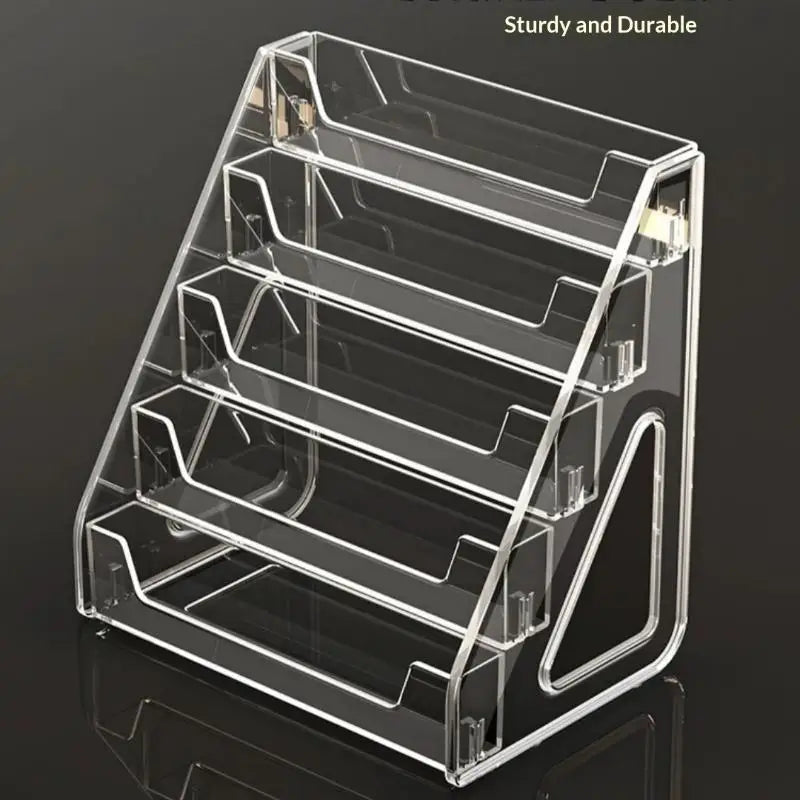A clear acrylic display stand with multiple slots for holding business cards and brochures.