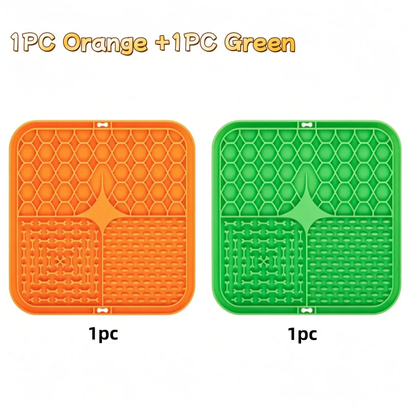 Two silicone lick mats for dogs, one orange and one green.