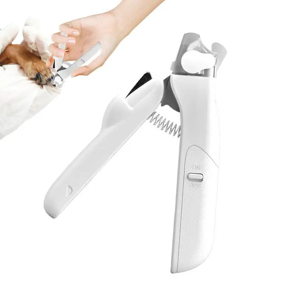 A hand is using a white professional LED pet nail clipper on a small animal's paw.