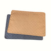 A set of three reusable washable dog pee pads in shades of tan and gray.