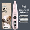 A pink pet grooming scissors device shown next to its packaging box.