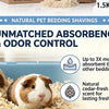 A guinea pig is shown resting on natural wood chip bedding, emphasizing absorbency and odor control.