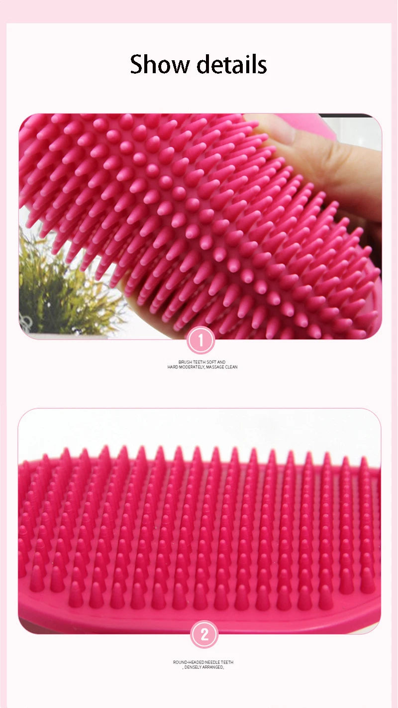Close-up view of a bright pink rubber pet grooming brush with numerous rounded teeth.
