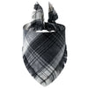 A plaid dog bandana with black and gray stripes and fringed edges.