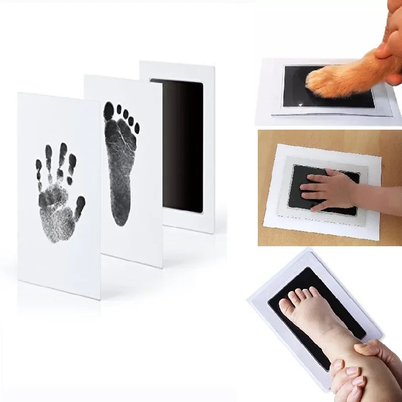 A set of baby handprint and footprint kits showing impressions in ink on white cardstock and skin.