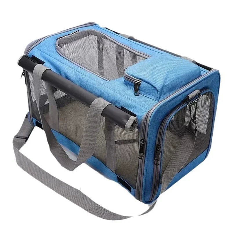 A blue breathable mesh pet carrier bag for cats and small dogs with gray straps.