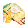 A yellow and green interactive snuffle book toy shaped like an egg toast for small dogs.