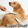 A hand is holding a small grooming comb and brush set for a golden retriever dog.