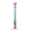 A pink silicone pet toothbrush for cats and small dogs with a green brush head.