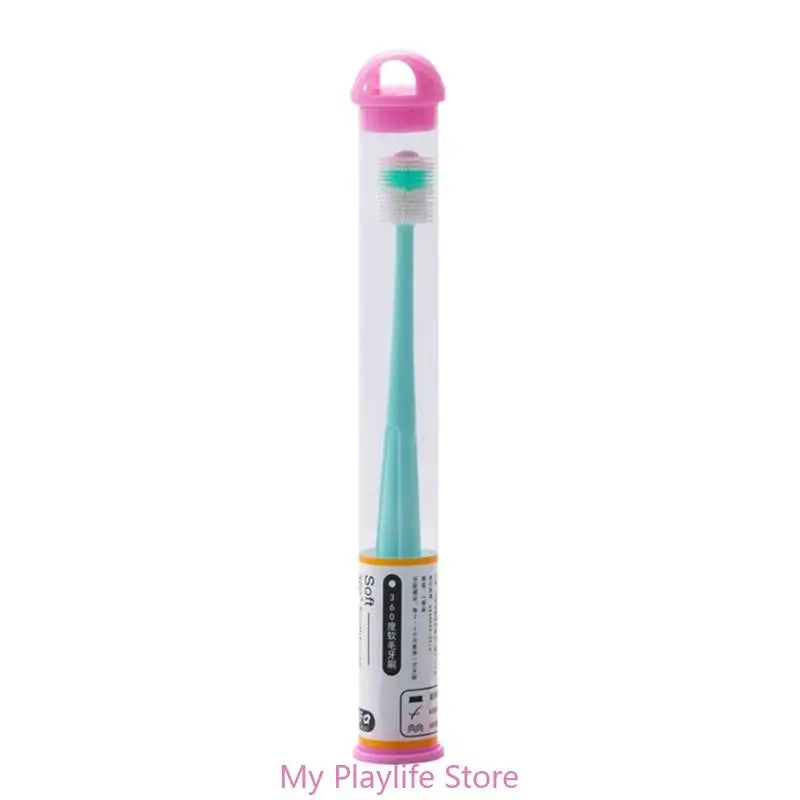 A pink silicone pet toothbrush for cats and small dogs with a green brush head.