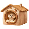 A light brown pet house with a round entrance featuring a fluffy white dog inside.