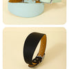 A collection of wide leather dog collars in pastel and solid colors, including mint green, pink, and black.