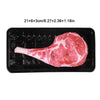 A raw cut of red meat placed on a black tray with dimensions listed above.