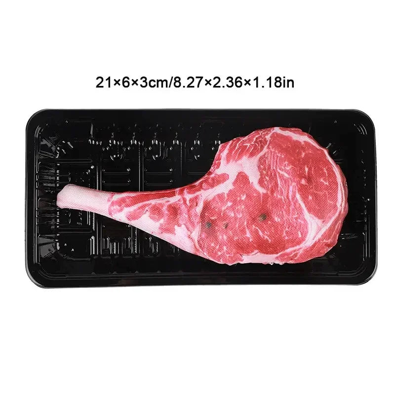 A raw cut of red meat placed on a black tray with dimensions listed above.