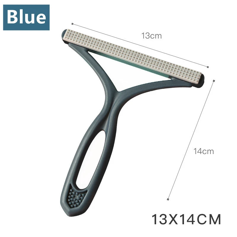 A blue portable lint and pet hair remover brush with a handle and bristles.