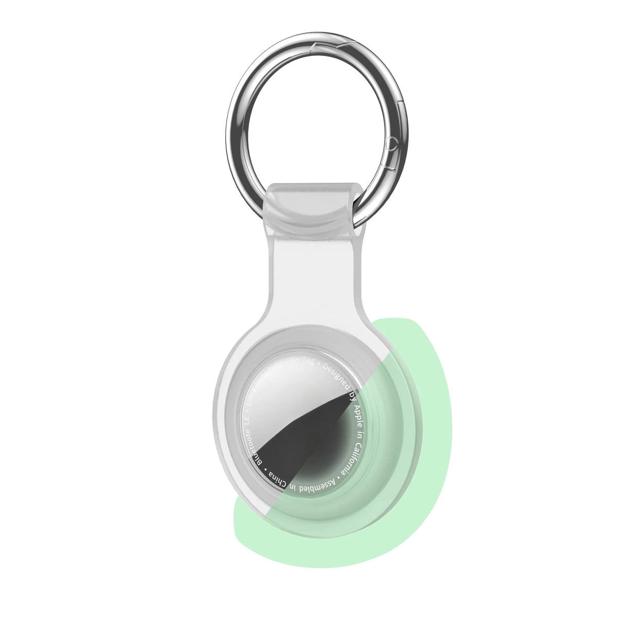A clear silicone protective cover for an AirTag attached to a metal keychain ring.