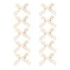 Un set de pinzas para el cabello con moños de cinta blanca