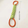 An orange and green braided rope toy with a loop for a durable dog chew.