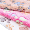 Two pink and white fleece pet bed mat covers with paw print patterns.