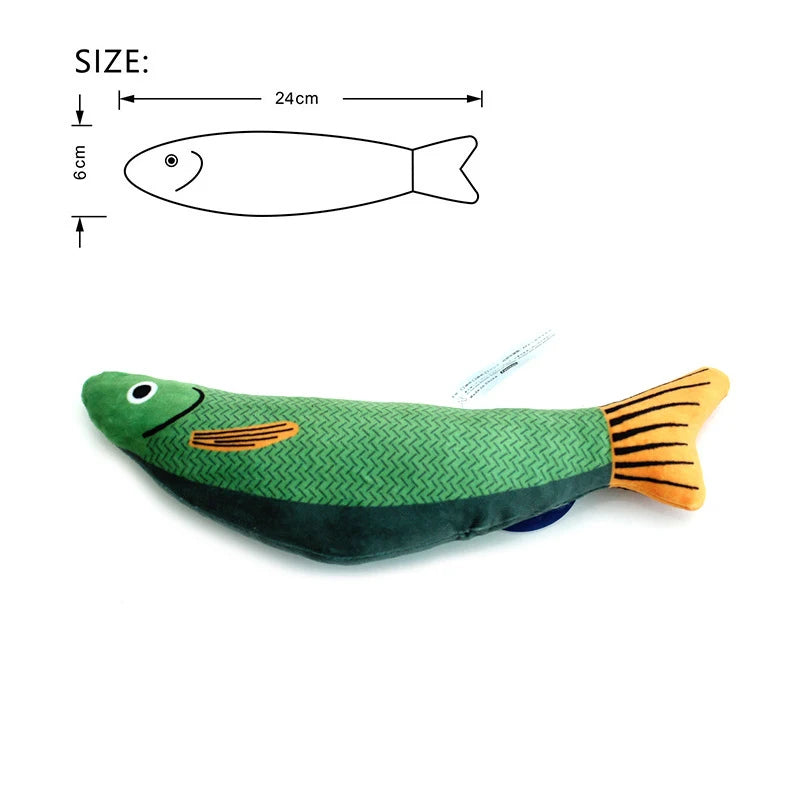A green plush toy shaped like a fish with orange fins and stripes, shown next to a size diagram.