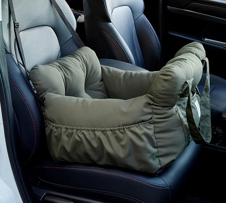 A green durable pet car seat with safety straps is shown installed in a car interior.