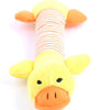 A yellow plush dog toy with orange accents and a striped neck, designed for squeaking.