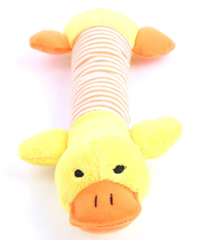 A yellow plush dog toy with orange accents and a striped neck, designed for squeaking.