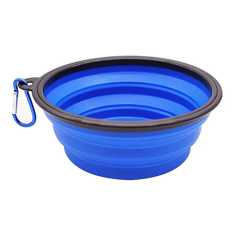 Blue silicone pet feeder bowl with a black rim and attached carabiner clip