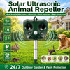 A green solar ultrasonic animal repeller device with a sensor is shown in a grassy outdoor setting.